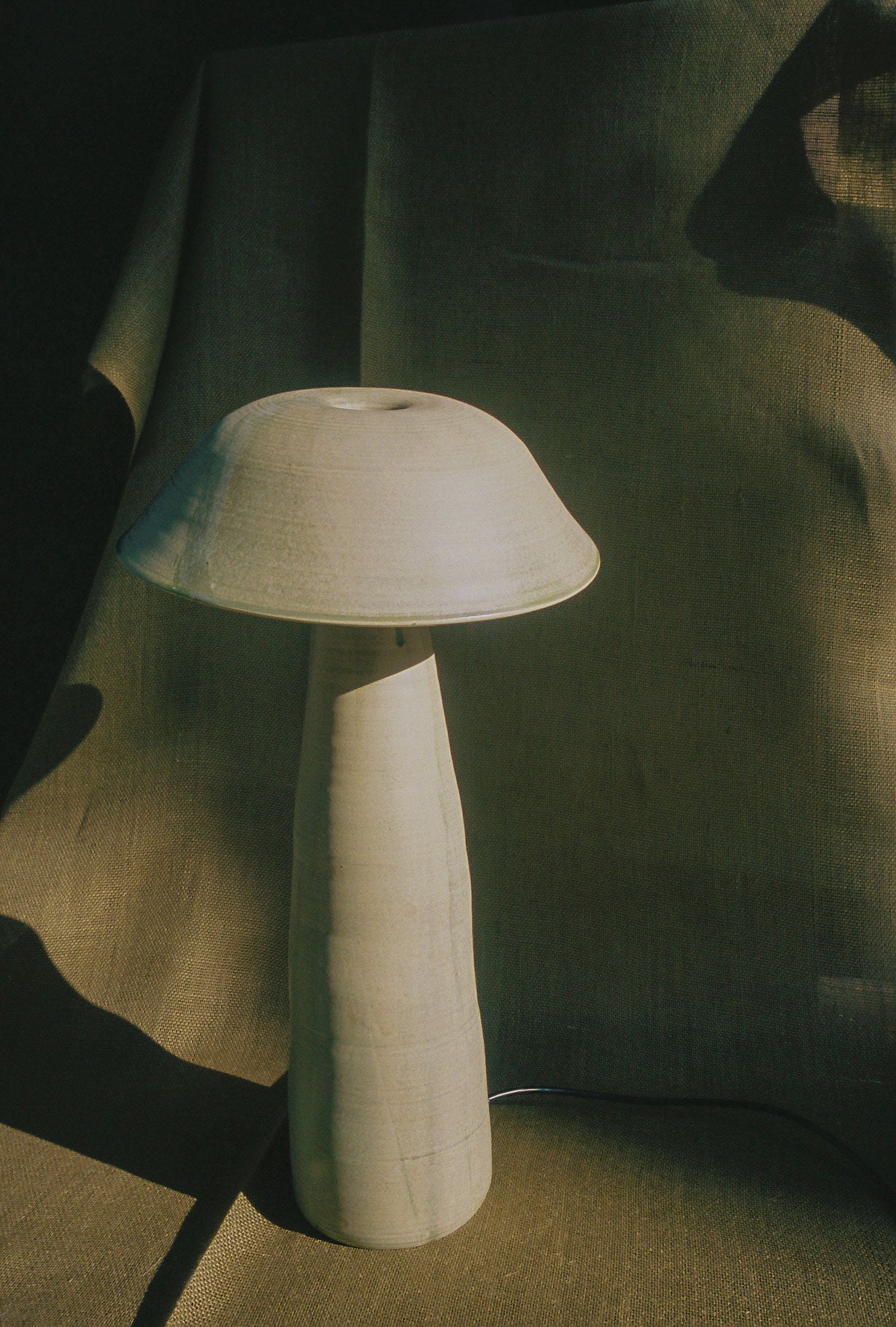 Larger 22 inch height Mushroom Lamp shot on a canvas backdrop