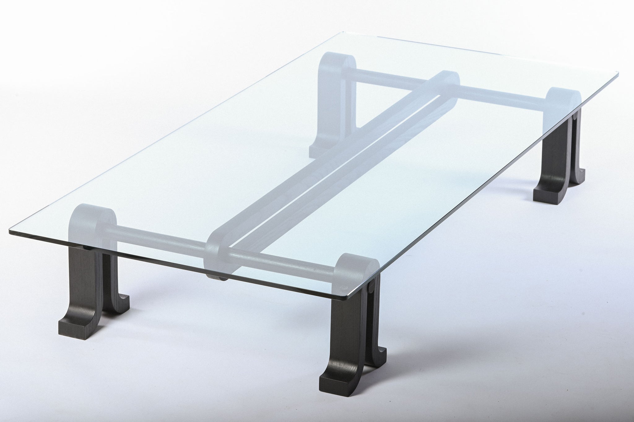 Loop Table in black lit on a white backdrop