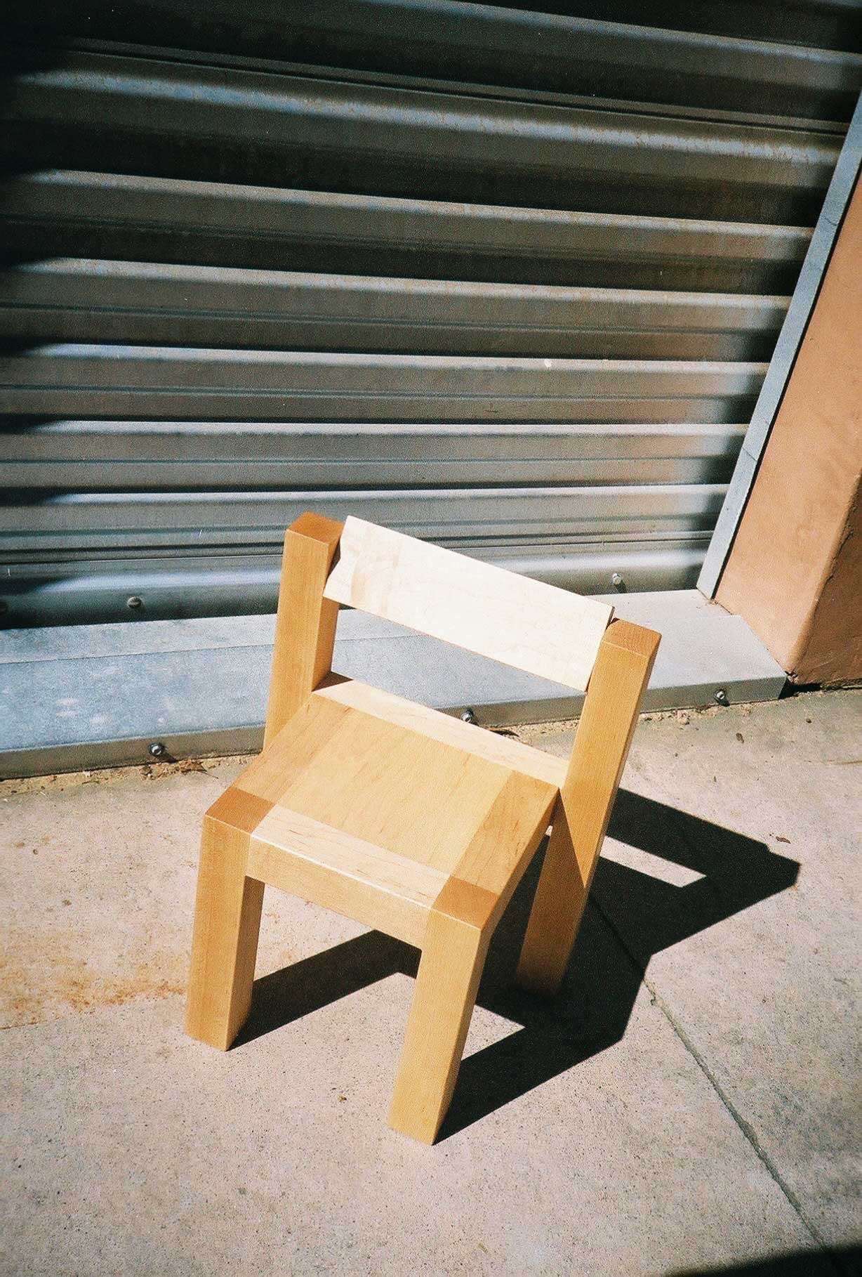 Natural finish Child's Anything Chair shot outside