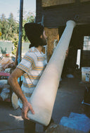 Ceramist carrying the Mushroom Floor Lamp base