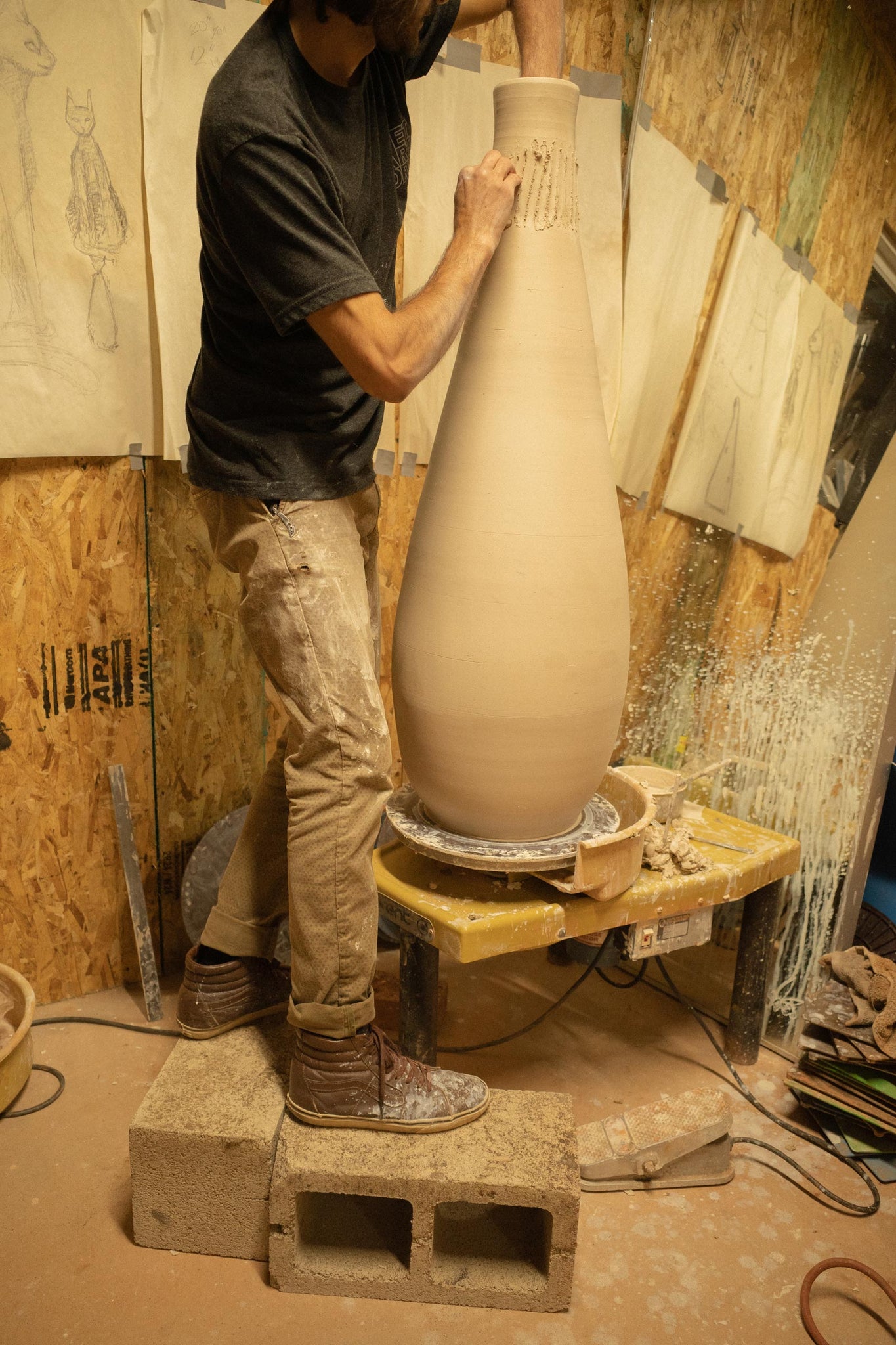 Ceramist throwing the Mushroom Floor Lamp base