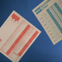 Information Charts hanging arranged on a blue backdrop