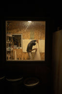 Ceramist throwing the Mushroom Floor Lamp base shot from outside the window