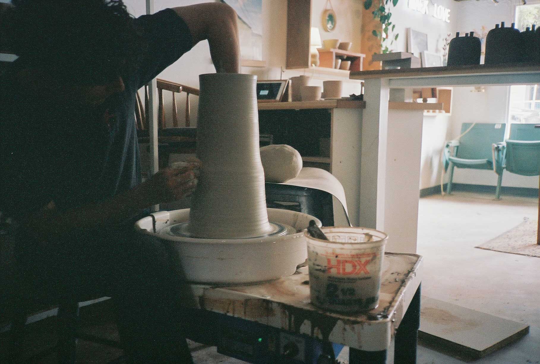 Ceramist throwing the Mushroom Lamp base